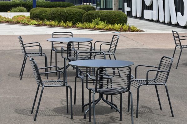 unity campus cambridge contour dining arm chair vine dining table round portrait 8